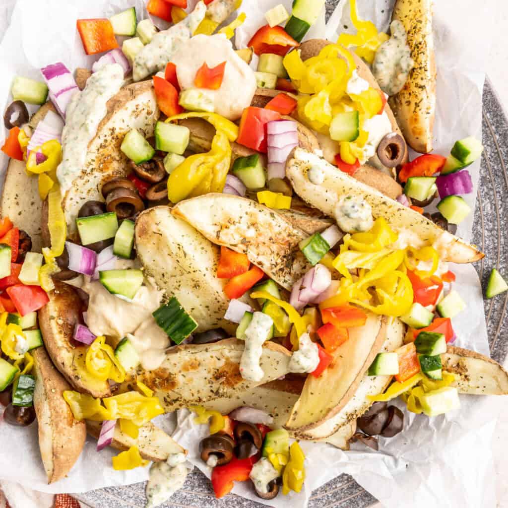 closeup of loaded mediterranean potato wedges