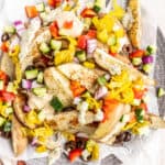 closeup of loaded mediterranean potato wedges