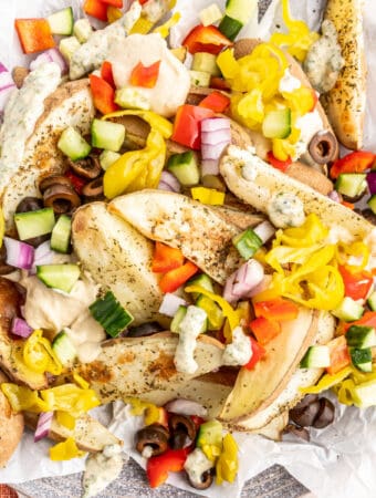 closeup of loaded mediterranean potato wedges