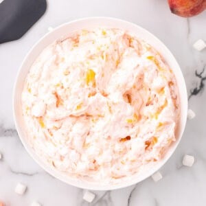 closeup of peach fluff salad in bowl
