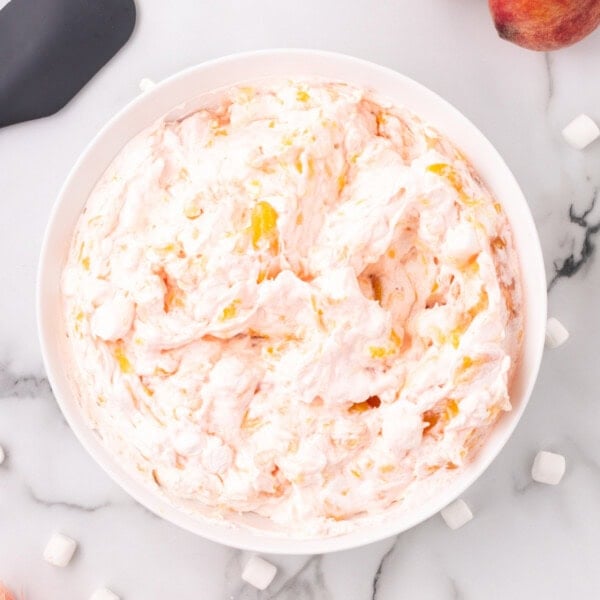 closeup of peach fluff salad in bowl