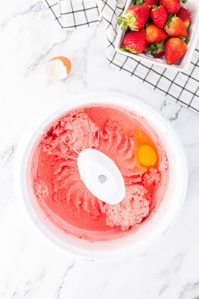 Creamed mixture with an added egg and vibrant pink color from the strawberry Jello.