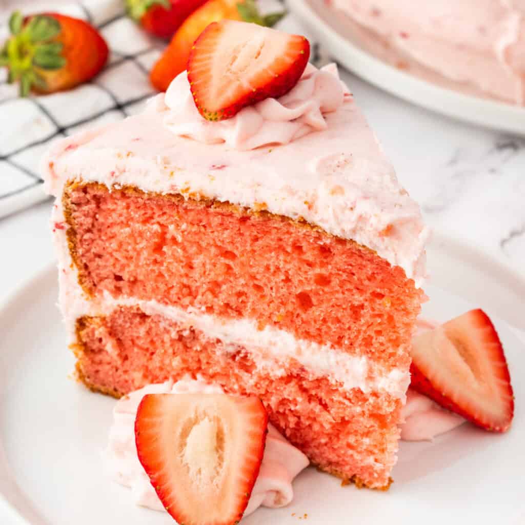 closeup of a slice of strawberry cake on plate