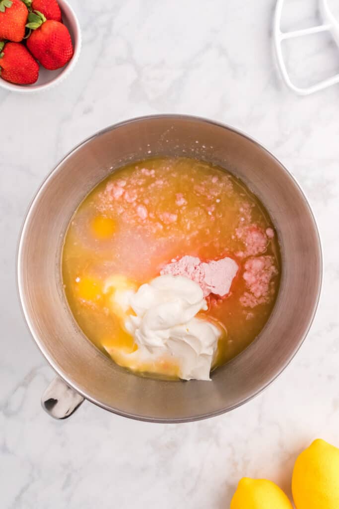 strawberry cake ingredients in mixing bowl before being mixed