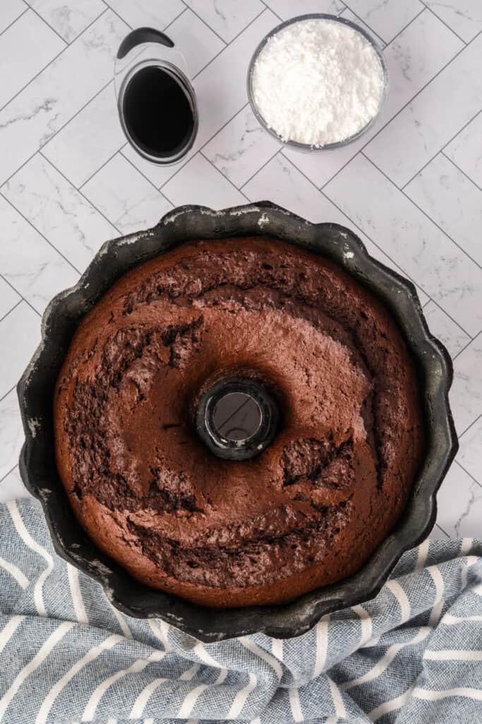 Baked chocolate Kahlua Bundt cake cooling in the pan.