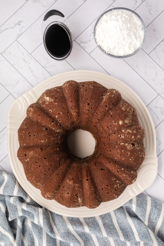 Chocolate Kahlua Bundt cake removed from pan and placed on a serving platter.