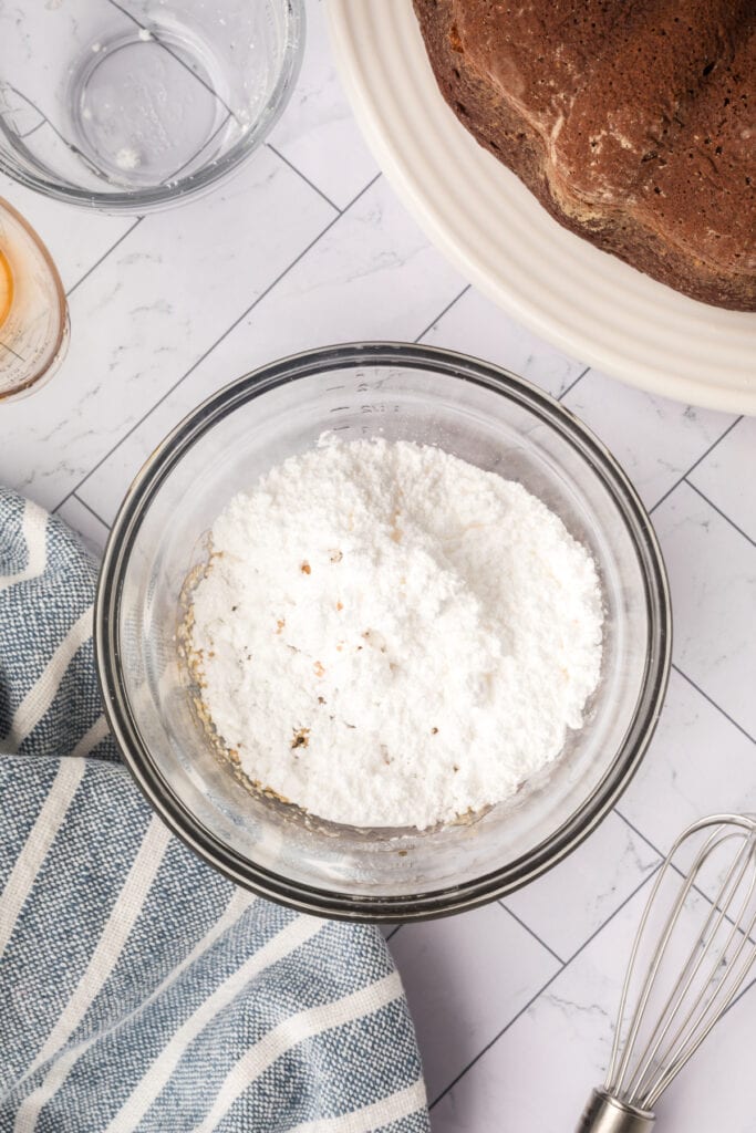 Powdered sugar in a bowl ready to be mixed for the Kahlua glaze.