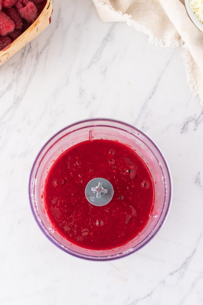 Smooth raspberry sauce blended to a jam-like consistency in a food processor.