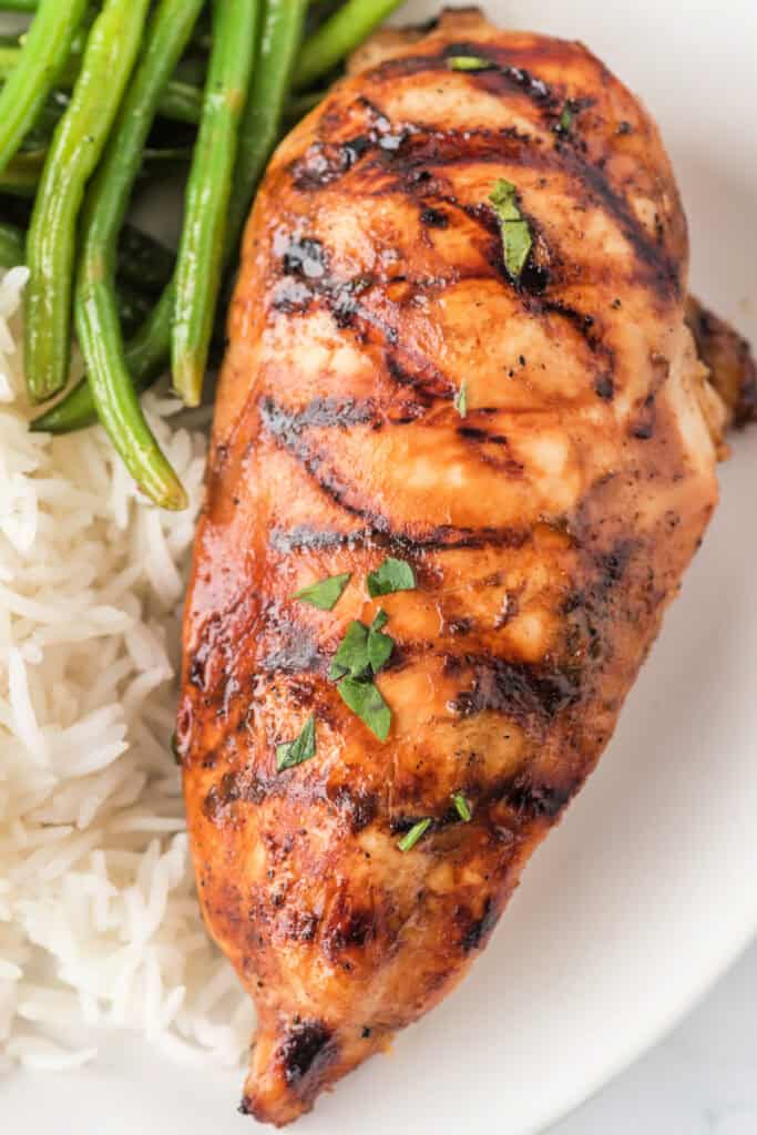 Grilled balsamic chicken breast served with white rice and green beans