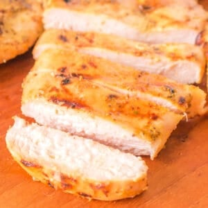 Square-cropped image of sliced grilled honey mustard chicken breast