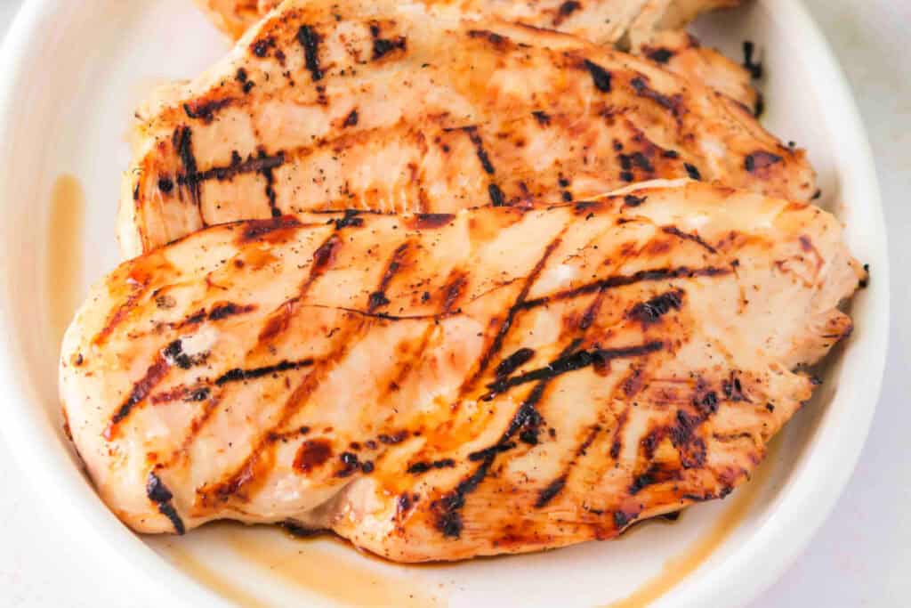 Close-up of grilled Margarita chicken breasts with charred grill lines