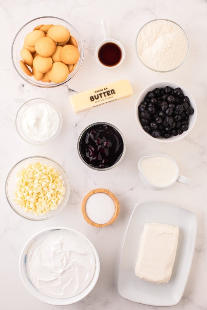 Overhead view of all ingredients for blueberry lasagna lush in individual bowls