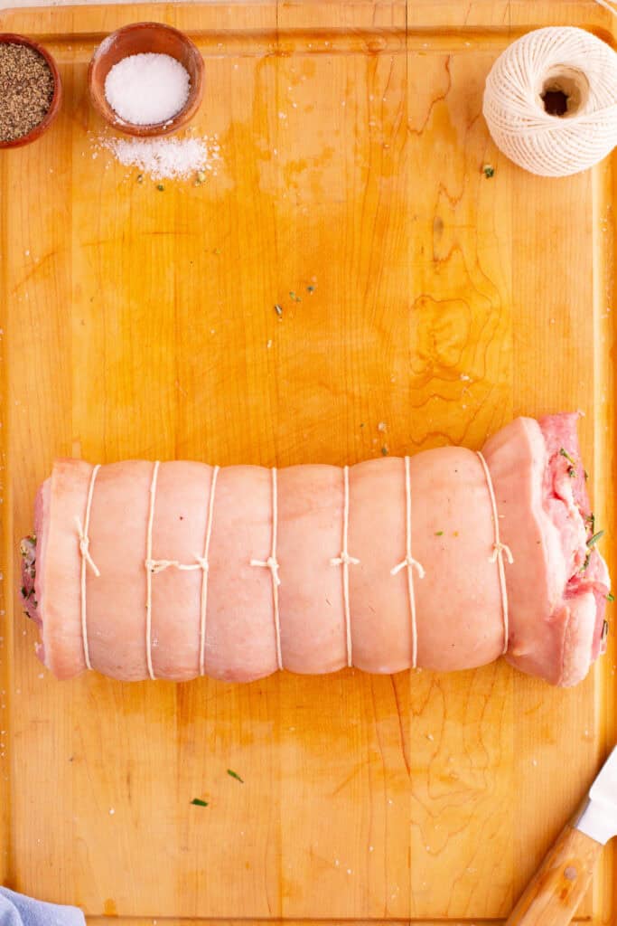 Rolled porchetta tied securely with butcher’s twine