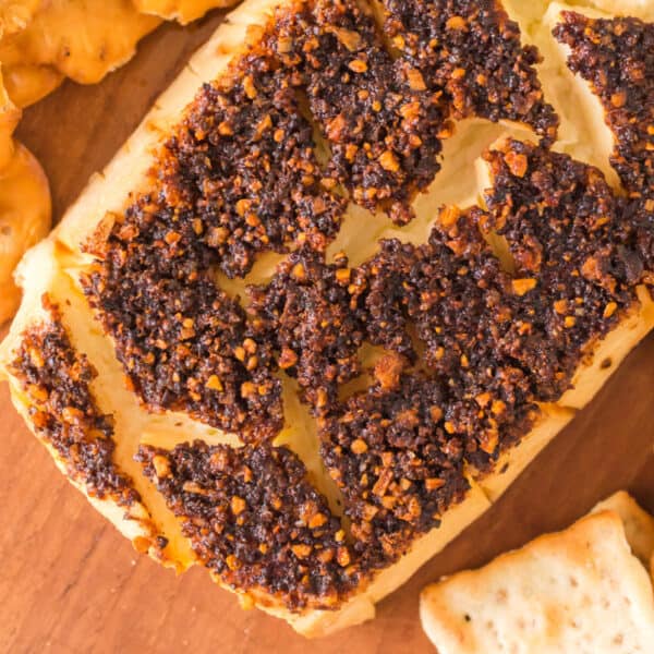 Overhead view of finished smoked cream cheese served with crackers