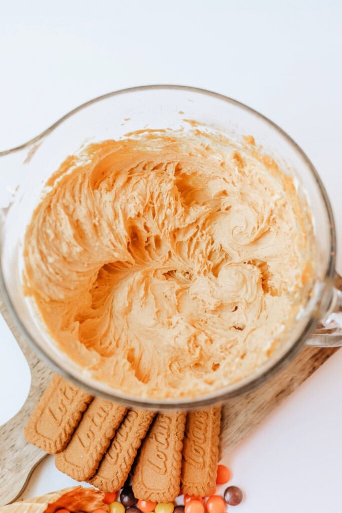 Cream cheese mixture fully blended with a rich pumpkin color and creamy texture