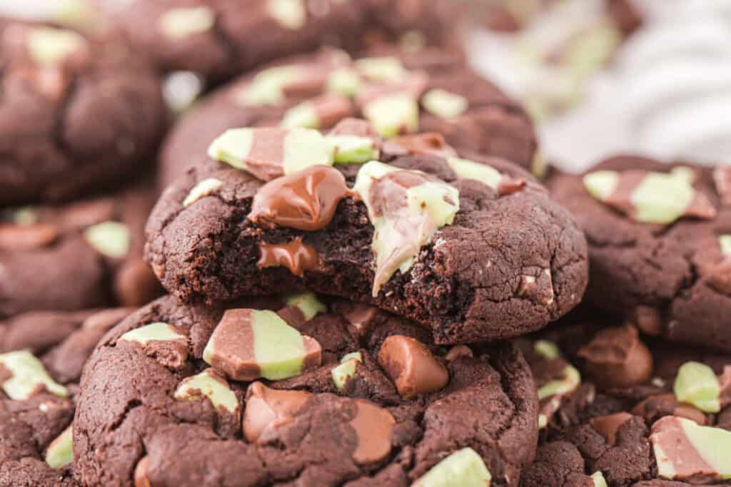 Close-up of Chocolate Mint Chip Cookies showing melted chocolate and mint pieces on the surface.