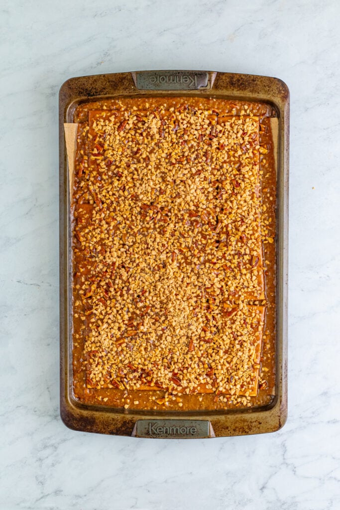 hot praline covered graham crackers sprinkled generously with toffee bits