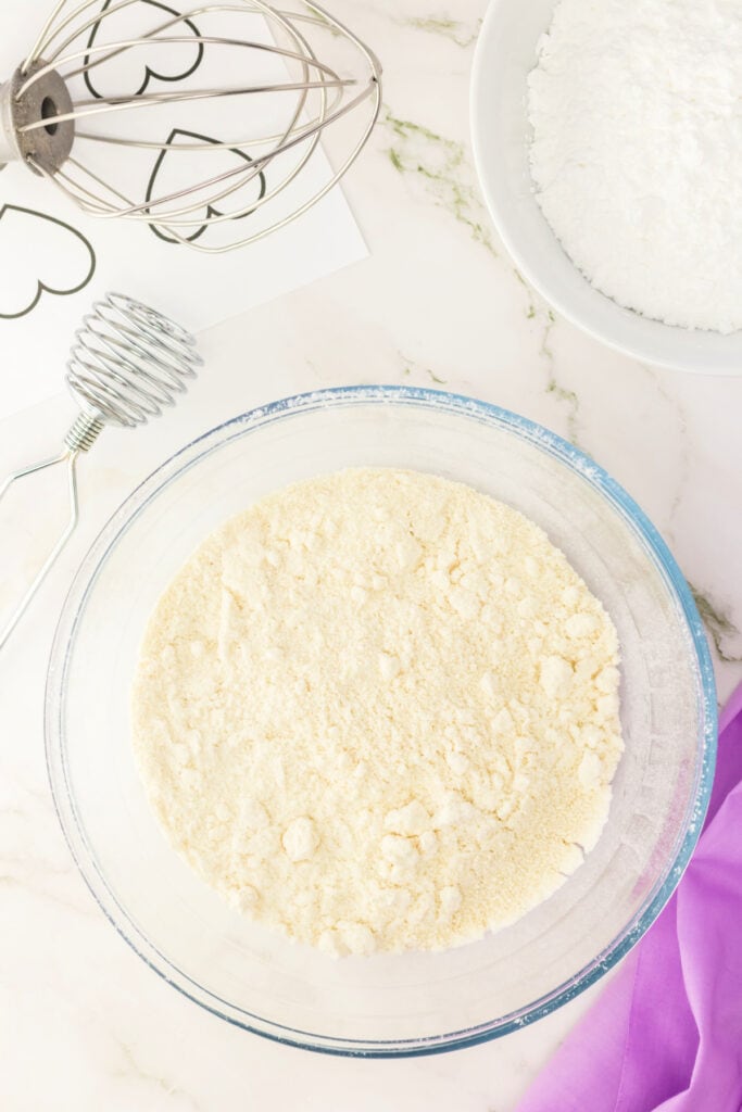 mixed almond flour and powdered sugar ready for folding into macaron batter