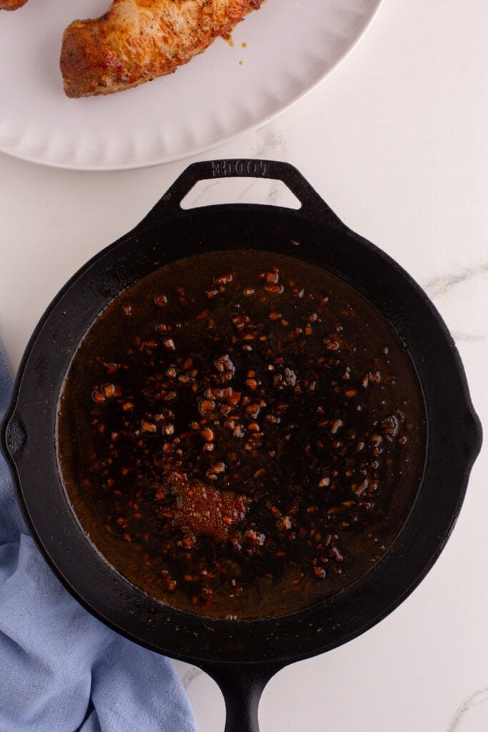 honey garlic sauce in cast iron skillet