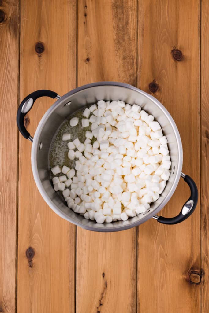 mini marshmallows added to melted butter in a saucepan