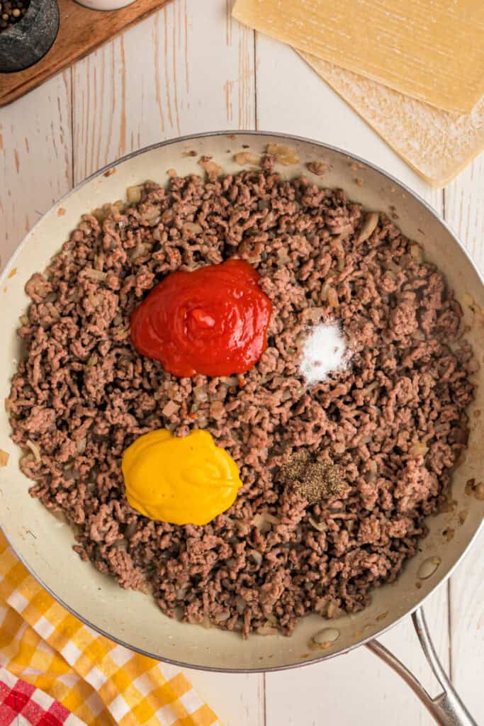 ketchup, mustard, salt, and pepper added to ground beef mixture for Big Mac Egg Rolls