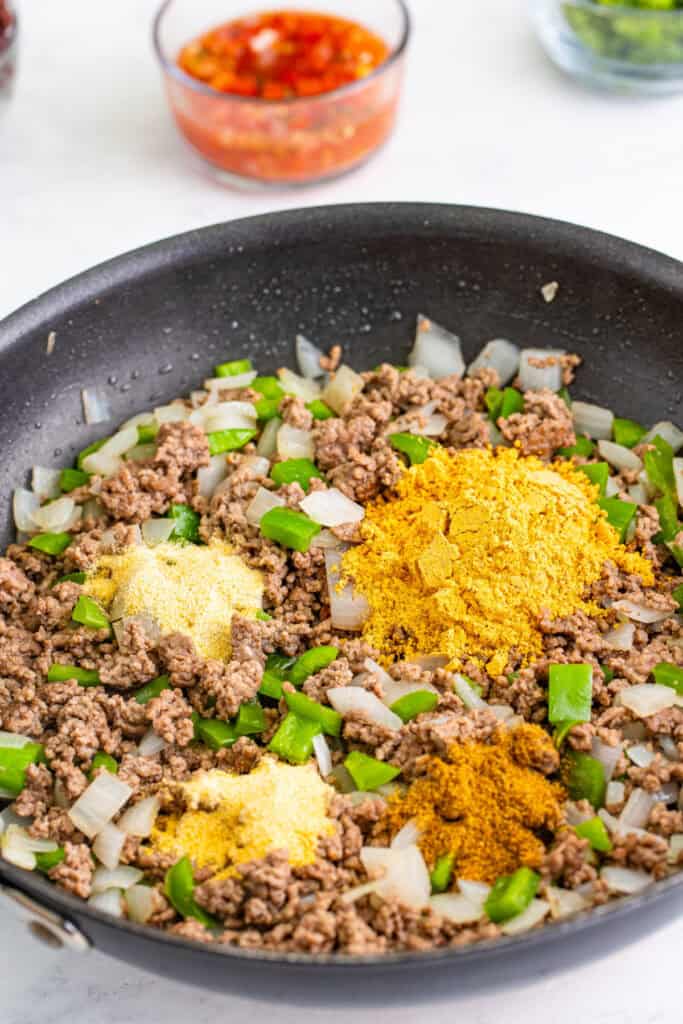 taco seasoning, garlic powder, onion powder, and cumin added to ground beef mixture for Taco Sloppy Joes