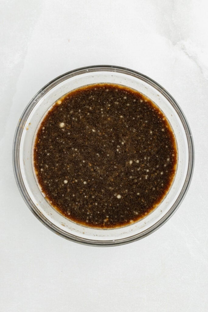Homemade teriyaki sauce mixed in a glass bowl for Chicken Teriyaki recipe