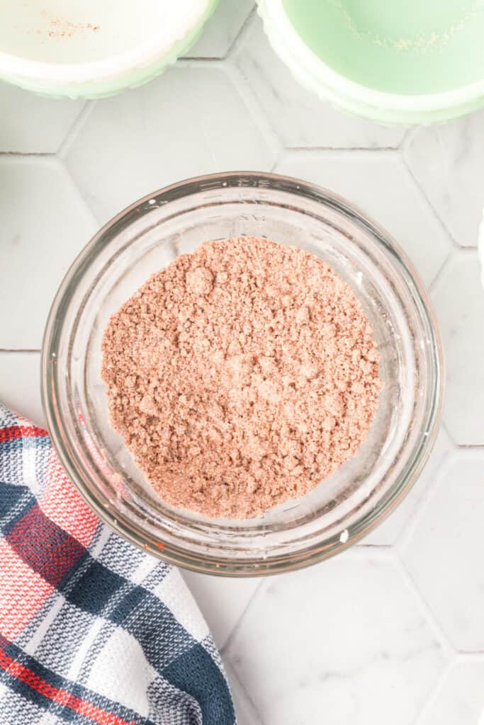 Mixed Homemade Fajita Seasoning blended together in a glass bowl