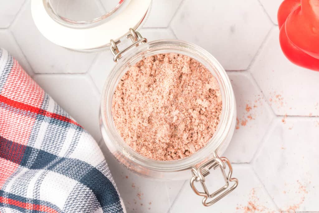 Overhead view of Homemade Fajita Seasoning in a glass storage jar
