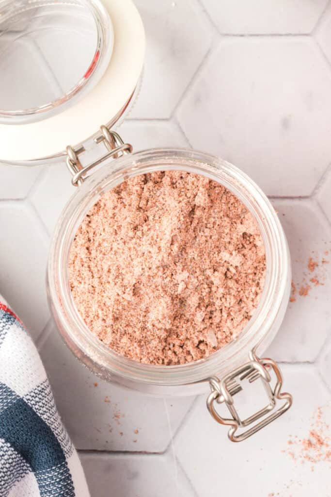 Close-up of Homemade Fajita Seasoning stored in a glass jar