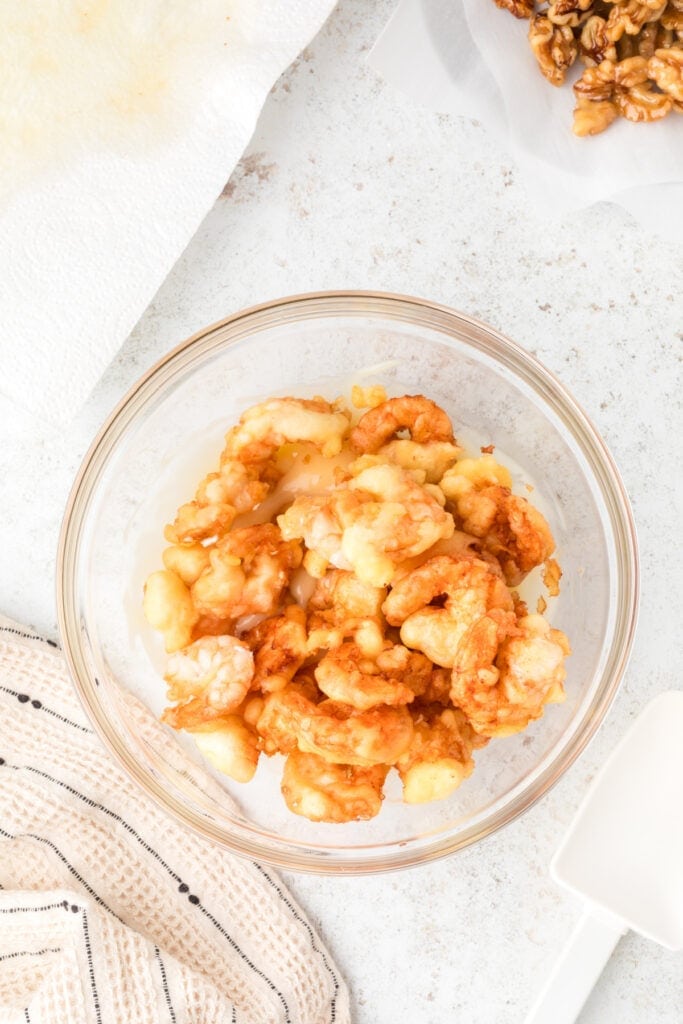 Crispy fried shrimp in a bowl before adding Honey Walnut Shrimp sauce