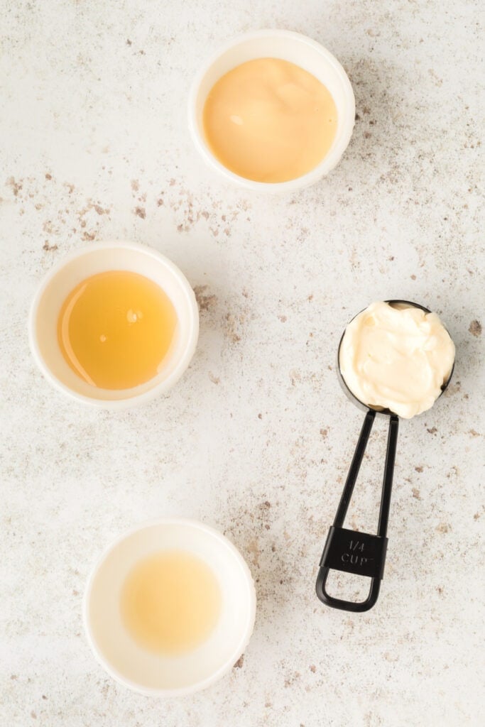 Ingredients for Honey Walnut Shrimp sauce including mayonnaise, honey, sweetened condensed milk, and lemon juice