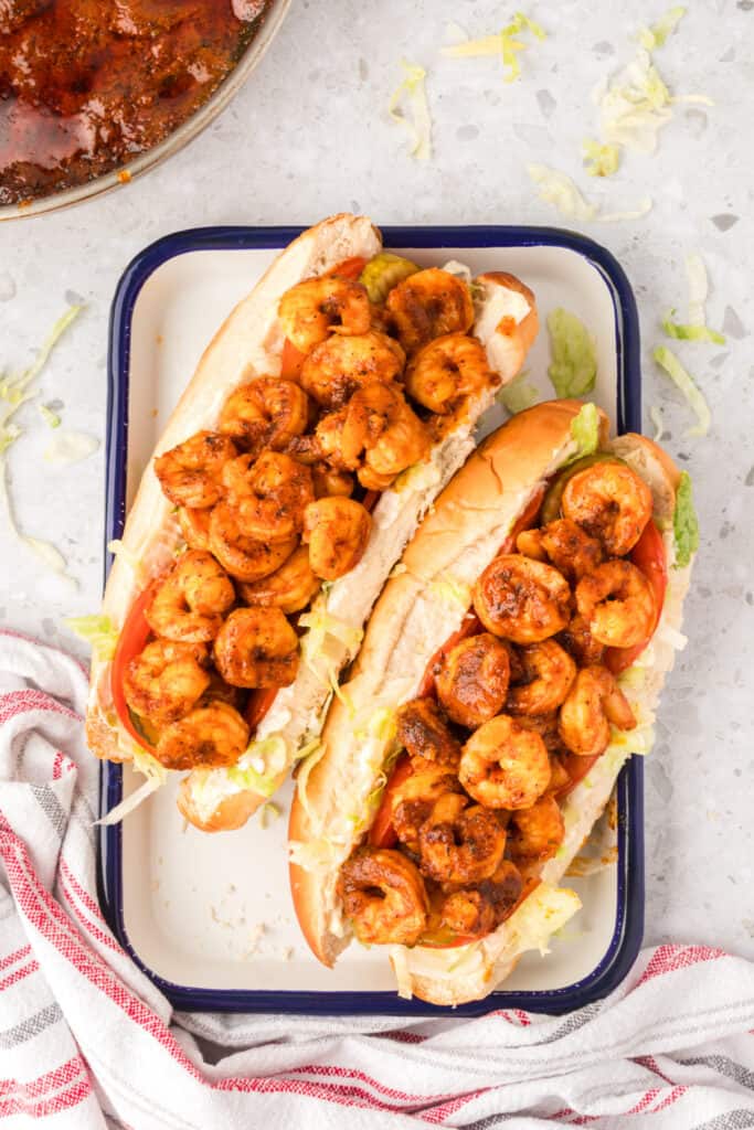 Louisiana-inspired shrimp po'boys with pickles and fresh vegetables