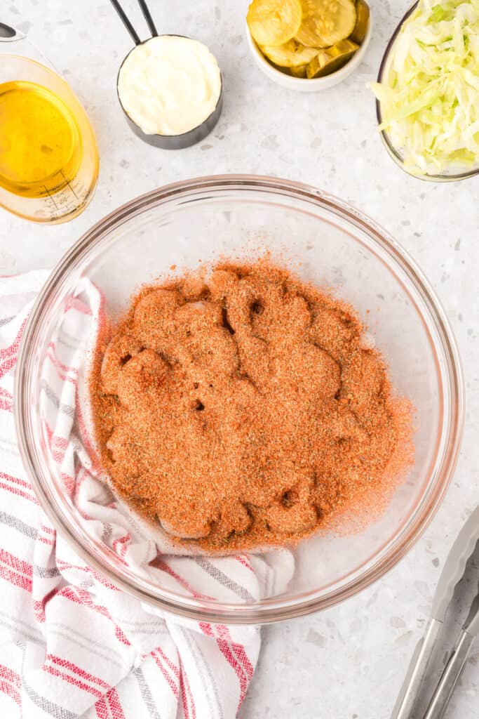 Shrimp coated in barbecue seasoning before cooking