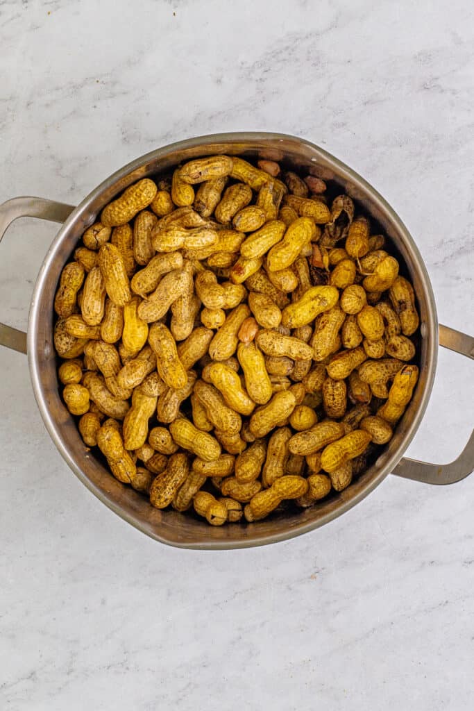 Raw peanuts in a large stockpot before making Creole Boiled Peanuts.