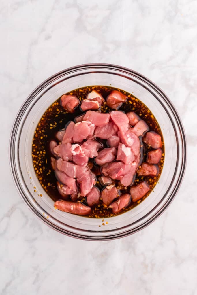Cubed pork tenderloin added to homemade Mongolian Pork marinade