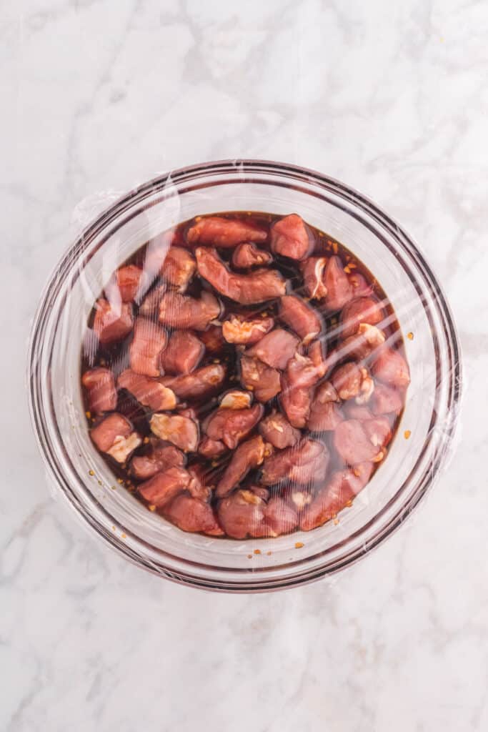 Pork marinating in a sweet and savory Mongolian sauce before cooking