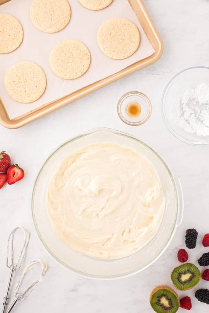 Homemade cream cheese frosting mixed until smooth and fluffy.