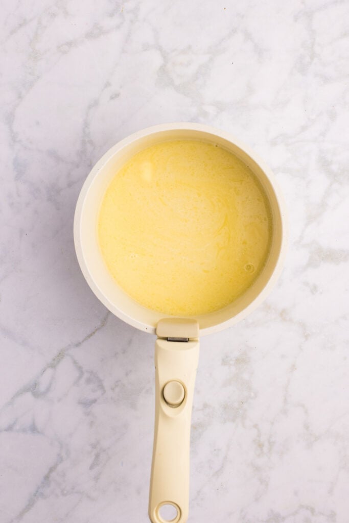 Warm milk mixture after the butter has melted for homemade hamburger buns