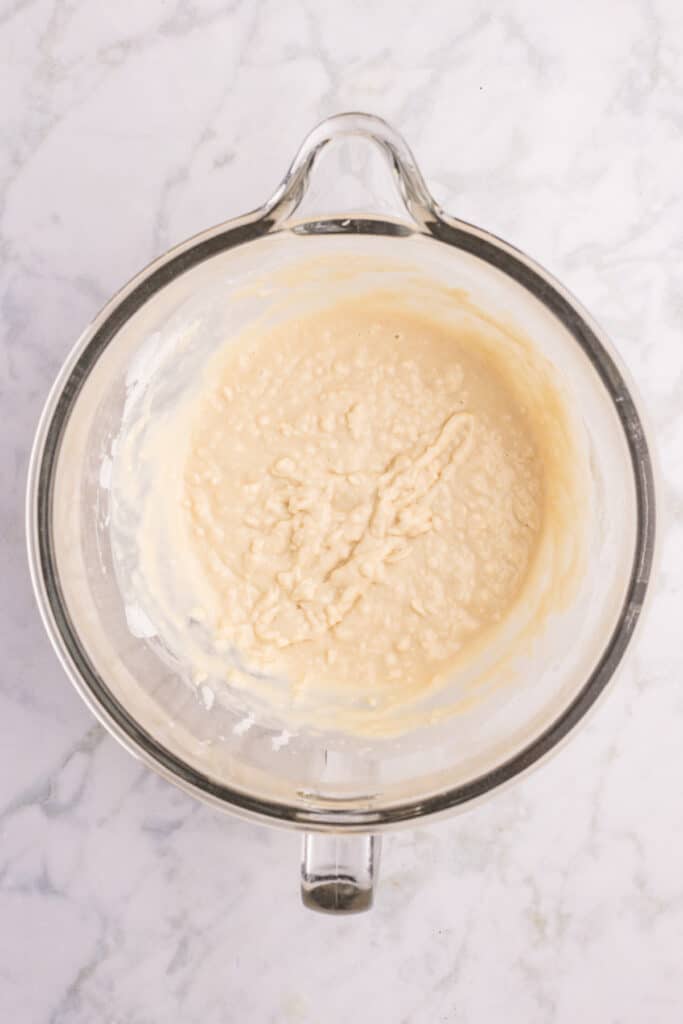 Homemade hamburger bun dough partially mixed before adding the egg