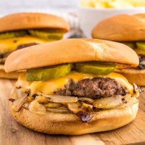 Homemade Oklahoma Onion Burger with caramelized onions, American cheese, and pickles