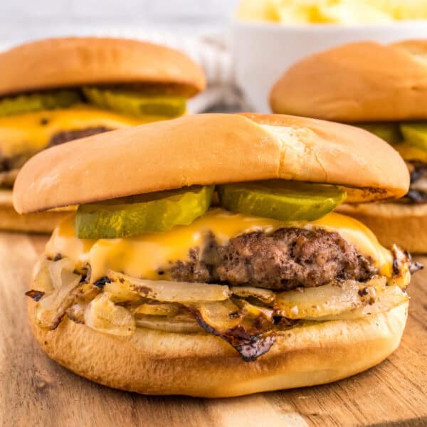 Homemade Oklahoma Onion Burger with caramelized onions, American cheese, and pickles