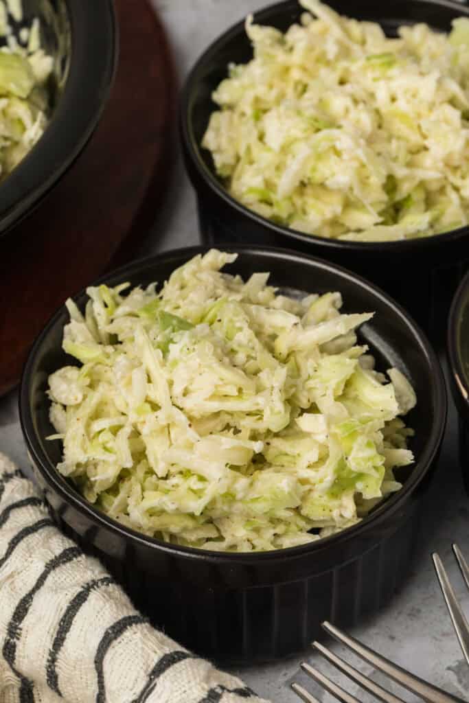 Individual ramekins filled with Southern-Style Slaw ready to serve.