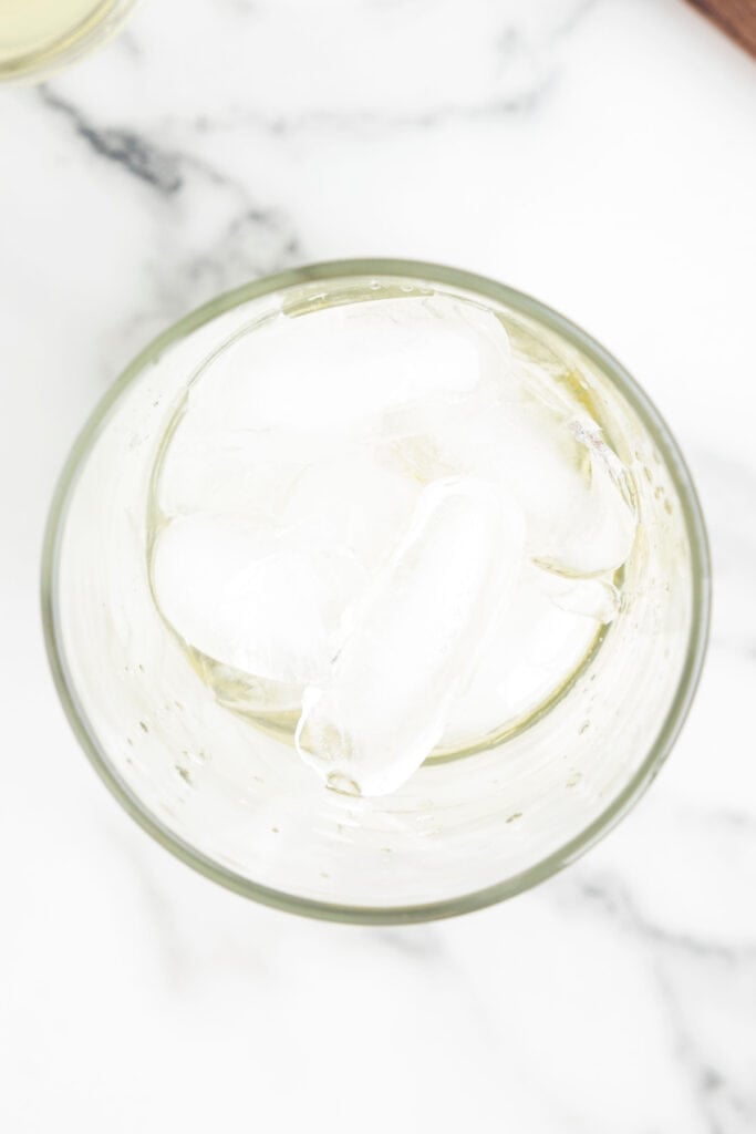 Blanco tequila poured over ice for an easy spicy margarita recipe