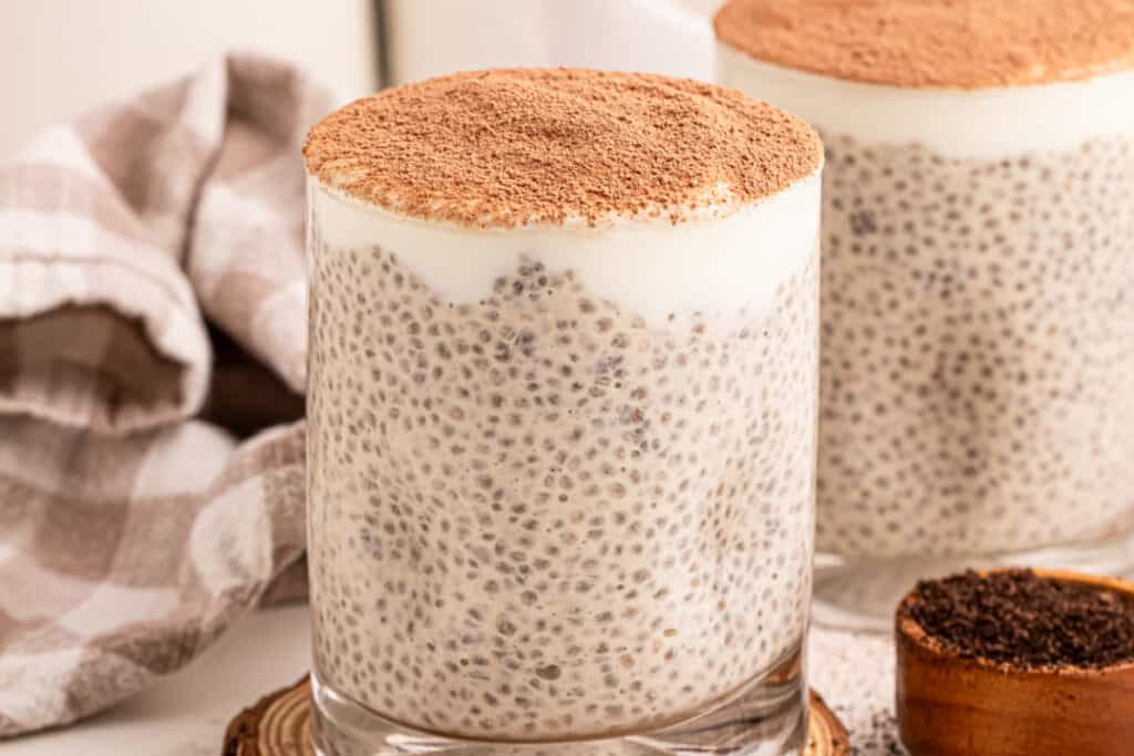 Creamy Tiramisu Chia Pudding topped with a thick layer of Greek yogurt and cocoa powder