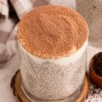 Tiramisu Chia Pudding with Greek yogurt and cocoa powder served in a glass