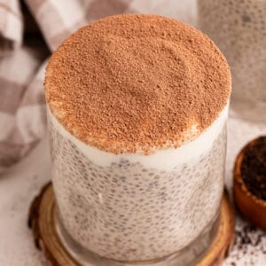 Tiramisu Chia Pudding with Greek yogurt and cocoa powder served in a glass