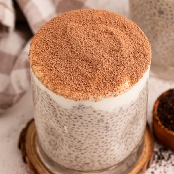 Tiramisu Chia Pudding with Greek yogurt and cocoa powder served in a glass