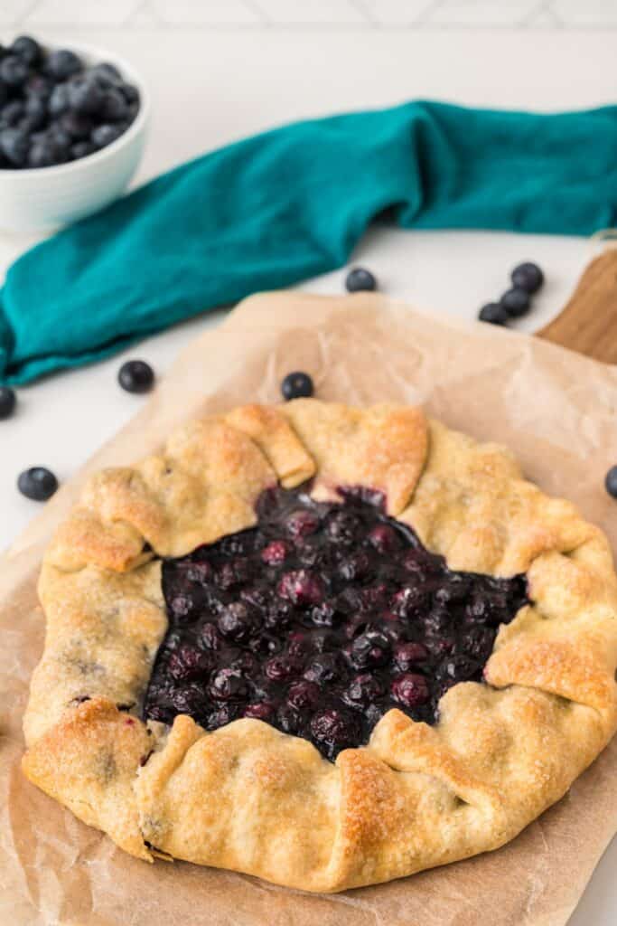 Whole baked Blueberry Galette with golden flaky crust and fresh blueberry filling