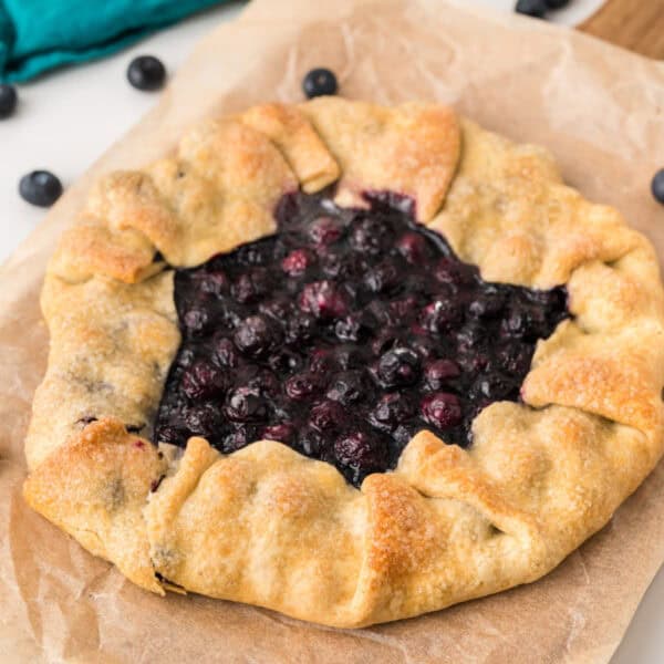 Easy Blueberry Galette with juicy blueberry filling surrounded by a golden folded pie crust